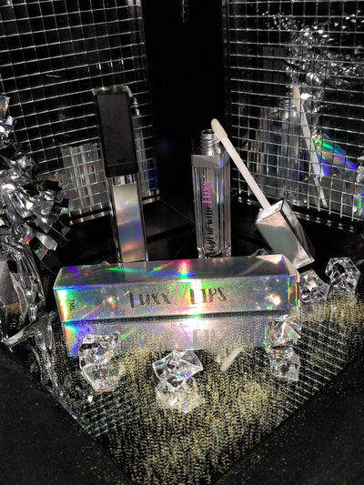Limited Edition Green Apple Paradise Pineapple Lip Gloss with iridescent packaging and applicator wand.